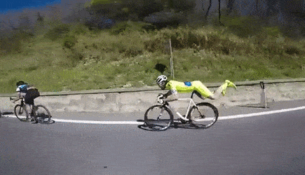 Someone doing a 'superman' on a bike, which you really shouldn't try.