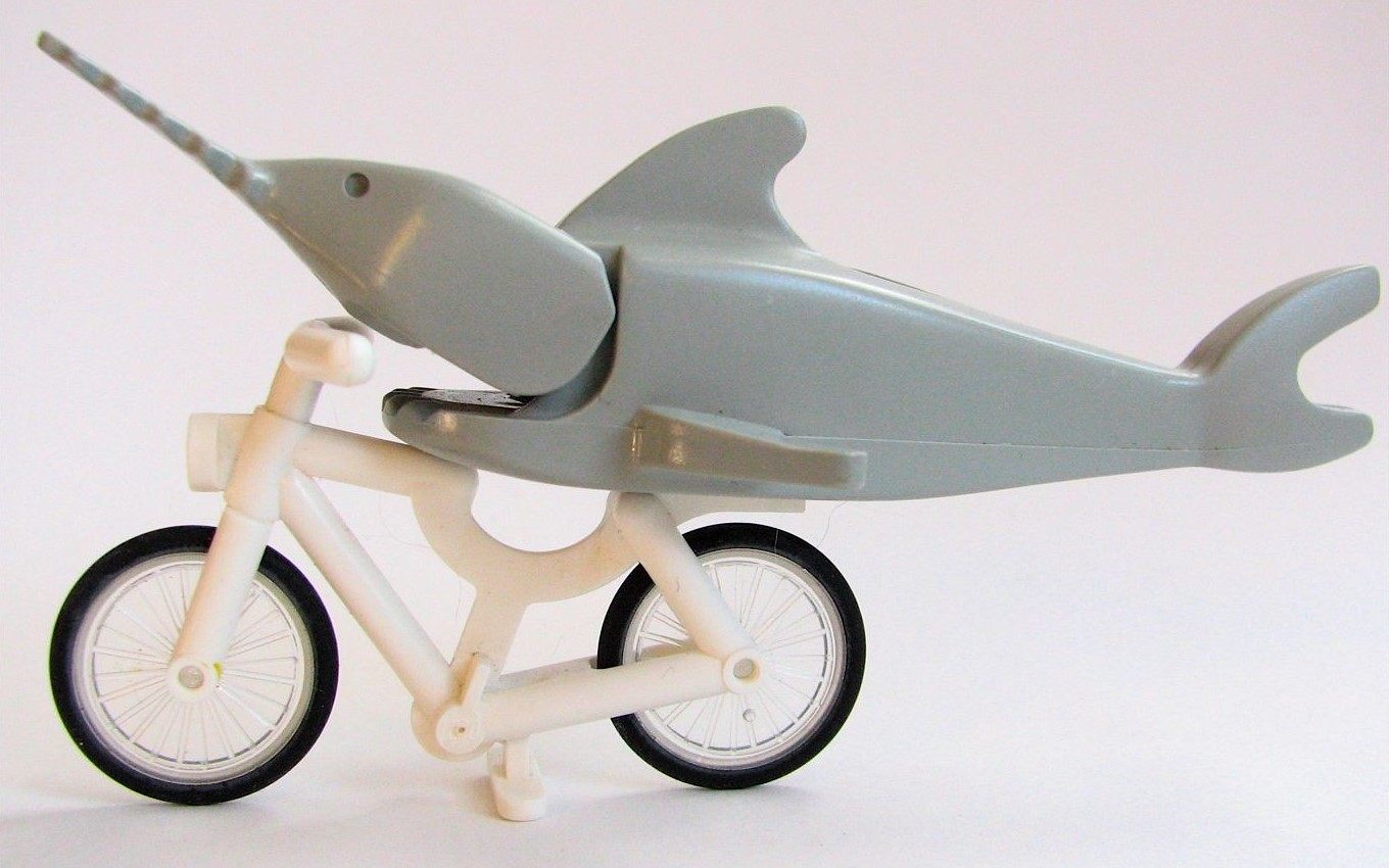 This is a photo of a LEGO swordfish on a bike