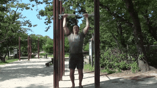 Jumping up to do a Pull-up, then tucking knees
