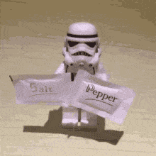 A gif of a Stormtrooper holding up salt and pepper