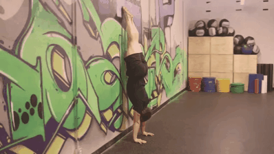 When you have both legs off the wall, you are doing a handstand! Woot!