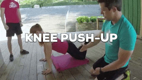 Knee push-ups like this are a unconfined way to progress to a regular push-up!