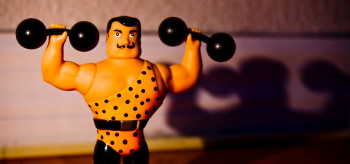 This strongman in leotard knows how to build muscle and strength.