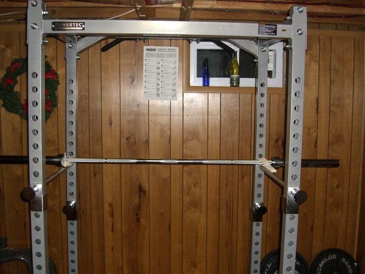 Use a squat rack like this.