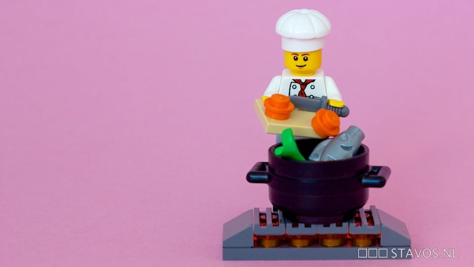 This LEGO is making a tasty meal of fish and veggies, so he can eat healthy.