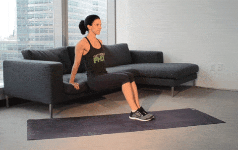 A gif of a woman doing a bench dip