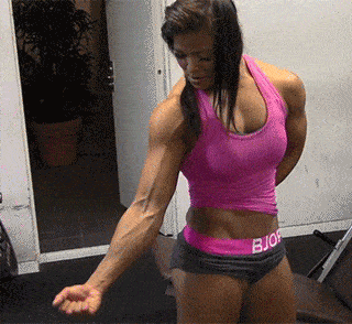 This gif shows a woman flexing.