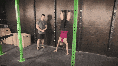 Coach Staci showing you the wall walk hold