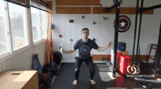 Here, you do normal jump rope jacks, but when you land, come down in a squat position.