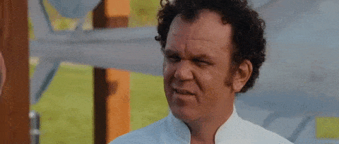 This gif shows a confused John Reily, who probably can't use a calculator.