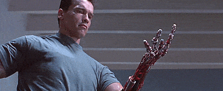 This gif shows the Terminator looking at his hand, who realistically doesn't have to worry about portion control.