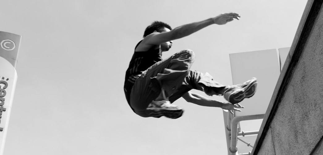 A photo of someone doing a parkour jump