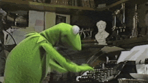 A gif of Kermit typing away