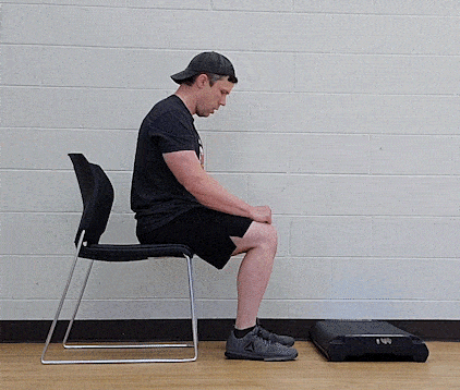 Coach Jim doing a seated calf raise