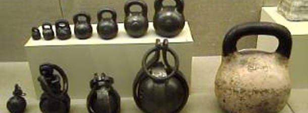 A picture of a bunch of old Kettlebells in a museum in Turkey.